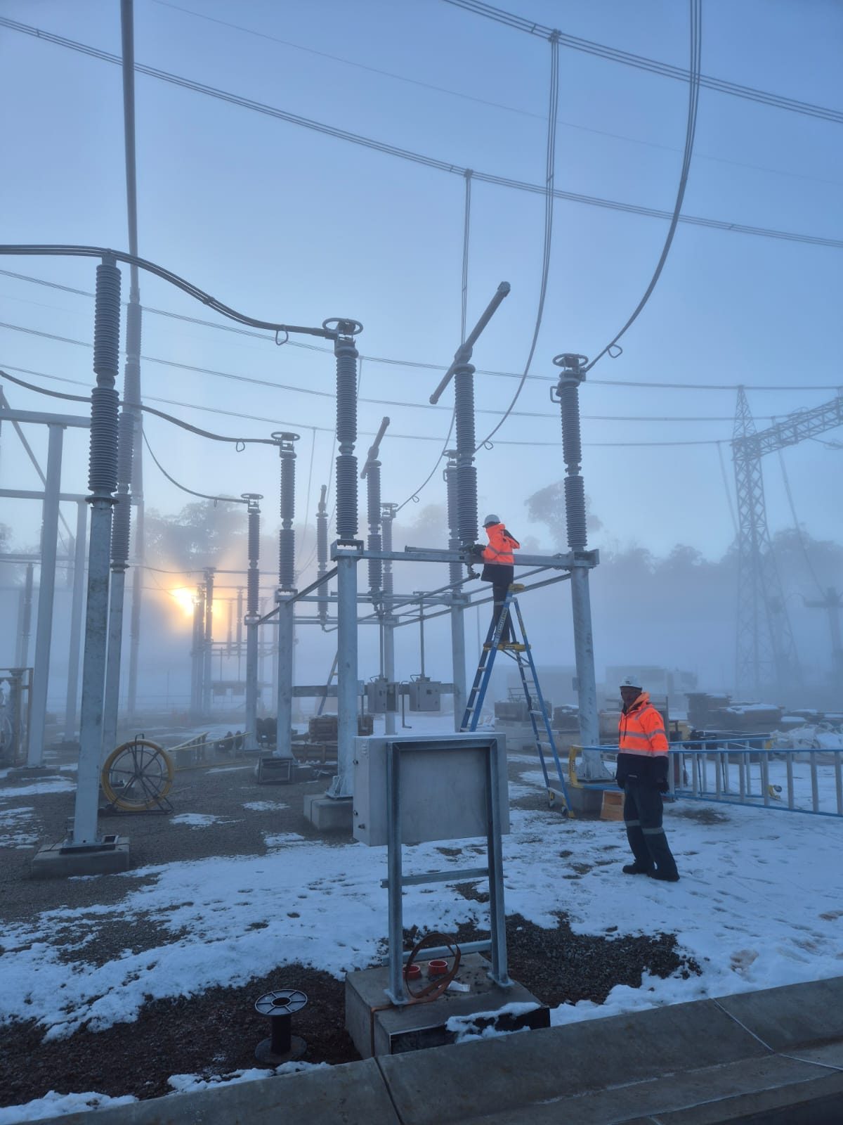 FES crew working on high voltage gear at first light