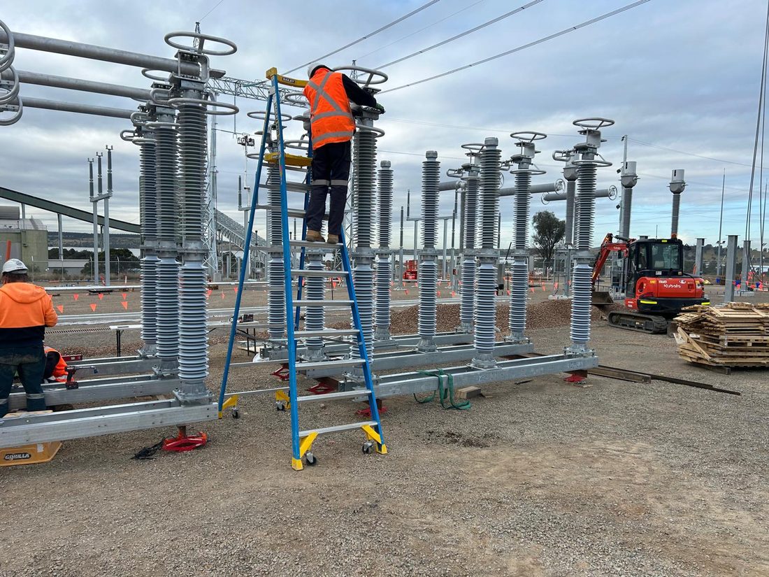 FES crew installing switchgear on a substation build